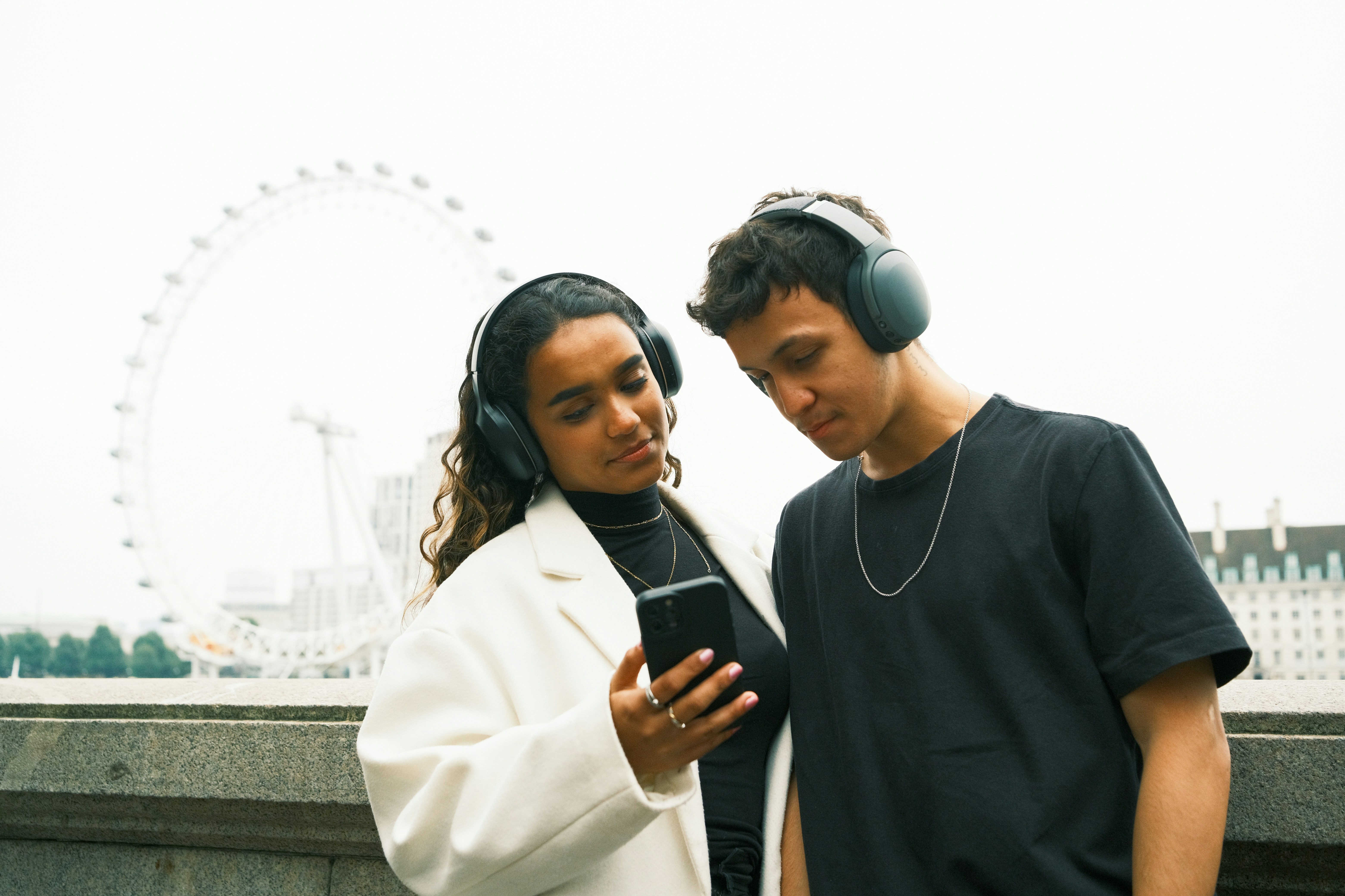 Two young artists listening to music